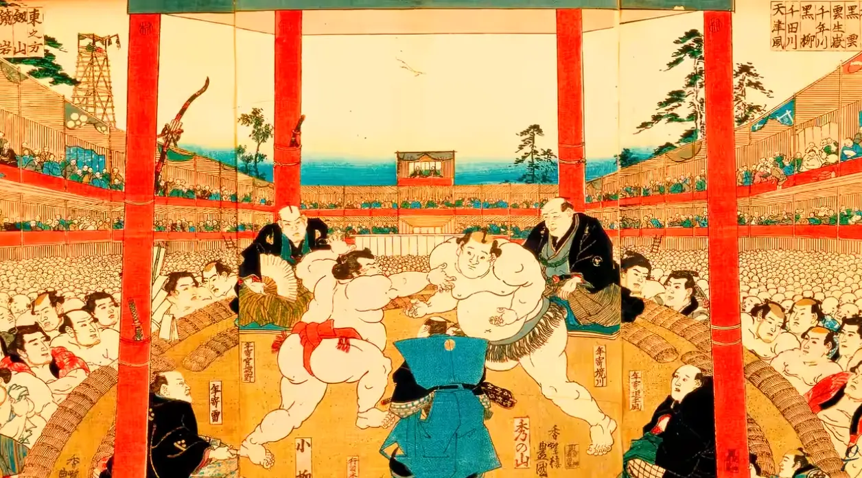 Sumo wrestlers preparing for a match, representing the guide for first-timers